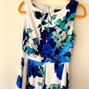 Sleeveless, Silk dress with blue flowers.